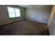 Bedroom featuring carpet, natural light, and neutral decor at 345 Deerwood Dr, Suwanee, GA 30024