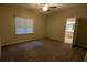 Bedroom with ceiling fan and walk-in closet at 345 Deerwood Dr, Suwanee, GA 30024