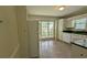 Kitchen with lots of natural light and appliances at 345 Deerwood Dr, Suwanee, GA 30024