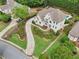 Beautiful aerial shot showing the house, driveway and backyard pool at 1225 Elk Ridge Cv, Alpharetta, GA 30005