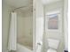 Clean and functional bathroom with a tub/shower combination and modern toilet at 1225 Elk Ridge Cv, Alpharetta, GA 30005