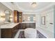 Bathroom featuring double vanity sinks with white countertops and a glass-enclosed shower at 1225 Elk Ridge Cv, Alpharetta, GA 30005
