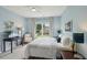 Comfortable bedroom with a large window offering scenic views of the surrounding area at 1225 Elk Ridge Cv, Alpharetta, GA 30005