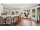 Open kitchen with granite countertops, stainless steel appliances, and an eat-in bar area at 1225 Elk Ridge Cv, Alpharetta, GA 30005