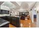Finished basement with hardwood floors, an entertainment area, and a kitchen island at 1225 Elk Ridge Cv, Alpharetta, GA 30005