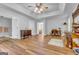 Spacious primary bedroom with hardwood floors, ceiling fan, and plenty of natural light at 190 Crestworth Ct, Powder Springs, GA 30127