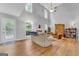 Bright living room with a ceiling fan, large windows, and hardwood floors, featuring cozy furniture at 190 Crestworth Ct, Powder Springs, GA 30127
