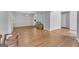 Open concept living room featuring hardwood floors and plentiful natural light at 190 Crestworth Ct, Powder Springs, GA 30127