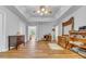 Large main bedroom with a ceiling fan, wood floors and a neutral color scheme at 190 Crestworth Ct, Powder Springs, GA 30127