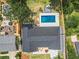 Aerial shot highlighting a modern home, pool, outdoor fireplace, and lush landscaping, ideal for outdoor living at 2648 Varner Ne Dr, Atlanta, GA 30345