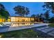 Stunning backyard with a modern pool, lounge chairs, and manicured landscaping at 2648 Varner Ne Dr, Atlanta, GA 30345