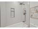 Modern bathroom featuring a shower-tub combo, white subway tile and black fixtures, offering a sleek design at 2648 Varner Ne Dr, Atlanta, GA 30345
