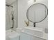 Elegant bathroom showcases modern design with a vessel sink, black fixtures, and tiled shower for spa-like experience at 2648 Varner Ne Dr, Atlanta, GA 30345