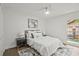 Cozy bedroom with a comfortable bed, neutral decor, and ample natural light from the window at 2648 Varner Ne Dr, Atlanta, GA 30345
