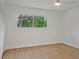 Minimal bedroom with hardwood floors and a large window at 2648 Varner Ne Dr, Atlanta, GA 30345