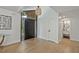 Bright foyer with hardwood floors, modern door, and stylish light fixture at 2648 Varner Ne Dr, Atlanta, GA 30345
