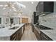 Bright kitchen with an oversized island, modern appliances, sleek cabinetry, and opens to the dining area at 2648 Varner Ne Dr, Atlanta, GA 30345
