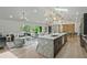 Open concept kitchen with a large island, flows to the living and dining areas, perfect for entertaining at 2648 Varner Ne Dr, Atlanta, GA 30345