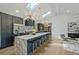 Well-equipped kitchen with a marble island, modern appliances, and elegant lighting fixtures at 2648 Varner Ne Dr, Atlanta, GA 30345