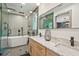Modern main bathroom featuring a double vanity, glass-enclosed shower, and standalone tub at 2648 Varner Ne Dr, Atlanta, GA 30345