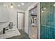 The main bathroom features a seamless glass shower, dual vanity, and a doorway to the walk-in closet at 2648 Varner Ne Dr, Atlanta, GA 30345