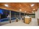 Stunning outdoor patio area overlooking the pool, featuring a bar and elegant lighting at 2648 Varner Ne Dr, Atlanta, GA 30345
