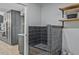Custom-designed pet shower in a modern mudroom or utility space, features tile and a convenient shower head at 2648 Varner Ne Dr, Atlanta, GA 30345