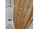 Modern wood staircase with unique light fixture leading to lower level at 2648 Varner Ne Dr, Atlanta, GA 30345