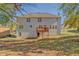 Large backyard with a wooden deck, ideal for outdoor entertaining at 3071 Springfair Trott, Lithonia, GA 30038