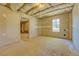 Unfinished basement with a window bringing in natural light, ready to be transformed at 3071 Springfair Trott, Lithonia, GA 30038