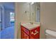 Powder room with single sink, updated fixtures and neutral color palette at 3071 Springfair Trott, Lithonia, GA 30038