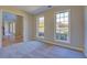 Bright bedroom with neutral carpet, large windows, and access to other rooms at 3071 Springfair Trott, Lithonia, GA 30038