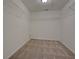 Walk-in closet featuring carpeted floors and wire shelving for optimal storage at 3071 Springfair Trott, Lithonia, GA 30038