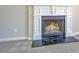 Close up of fireplace with white mantle and black hearth on carpeted floors at 3071 Springfair Trott, Lithonia, GA 30038