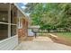 Outdoor patio with grill and seating area, perfect for entertaining at 3918 Oberlin Ct, Tucker, GA 30084