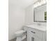Modern bathroom featuring a vanity with white countertop and sleek fixtures at 3918 Oberlin Ct, Tucker, GA 30084