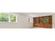Bright bedroom with built-in shelving, storage, and natural light from the windows at 3918 Oberlin Ct, Tucker, GA 30084