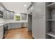 Updated kitchen featuring gray cabinets, modern stainless steel appliances, and open layout at 3918 Oberlin Ct, Tucker, GA 30084