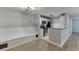 Open concept dining and kitchen space with built-in bench seating and modern appliances at 4106 Santa Fe Pkwy, Atlanta, GA 30350