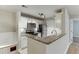 Modern kitchen with stainless steel appliances, granite countertops, and a built-in dining nook at 4106 Santa Fe Pkwy, Atlanta, GA 30350