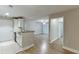 Open living and kitchen area featuring granite countertops and durable flooring at 4106 Santa Fe Pkwy, Atlanta, GA 30350