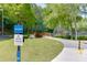 Scenic paved walking trail through the community, with lush green surroundings at 4106 Santa Fe Pkwy, Atlanta, GA 30350