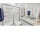 Clean and modern bathroom featuring a glass-enclosed shower and granite vanity at 1451 Stephens View Dr, Loganville, GA 30052