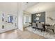 Bright dining room with hardwood floors, a modern chandelier, and stylish decor for comfortable entertaining at 1451 Stephens View Dr, Loganville, GA 30052