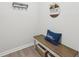 Cozy entryway with bench seating, decorative pillow, and welcome sign at 1451 Stephens View Dr, Loganville, GA 30052