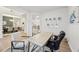 A dedicated office area with a work space and meeting space with seating at 1451 Stephens View Dr, Loganville, GA 30052