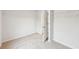 Empty walk-in closet with white walls, carpeted floors, and wire shelving at 1451 Stephens View Dr, Loganville, GA 30052