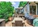 Expansive backyard deck with dining area and upper balcony, perfect for outdoor living at 2639 Acorn Ne Ave, Atlanta, GA 30305