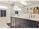 Bathroom with a large double sink vanity, white walls, and modern lighting at 2639 Acorn Ne Ave, Atlanta, GA 30305