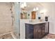 Elegant bathroom featuring a glass-enclosed shower and double sink vanity at 2639 Acorn Ne Ave, Atlanta, GA 30305